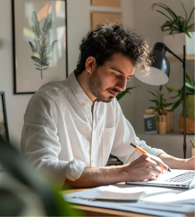 A man Setting and doing his work